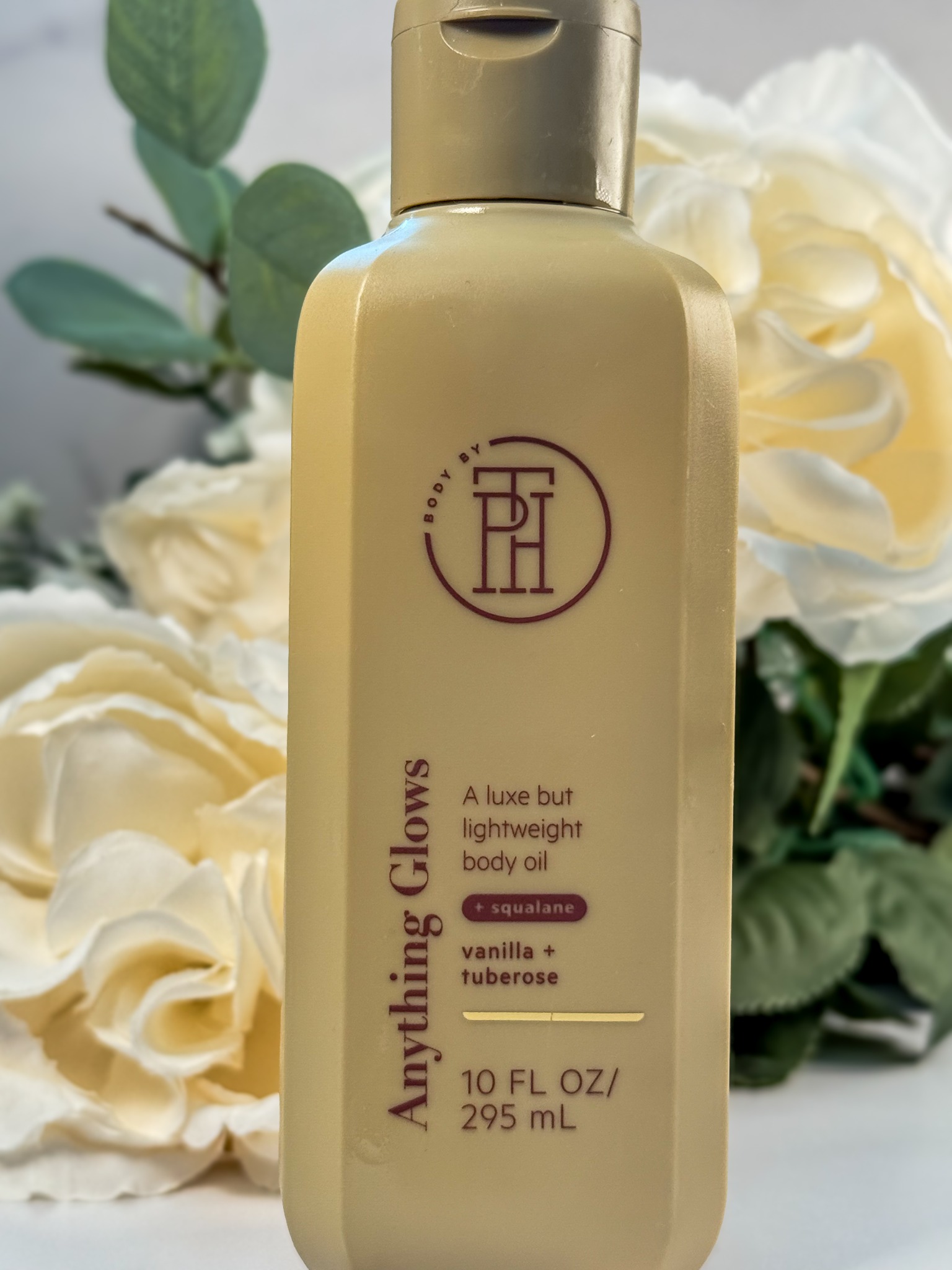 Anything Glows body oil — original product photograph